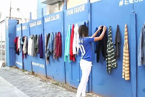 A wall of donated clothes for homeless people to take