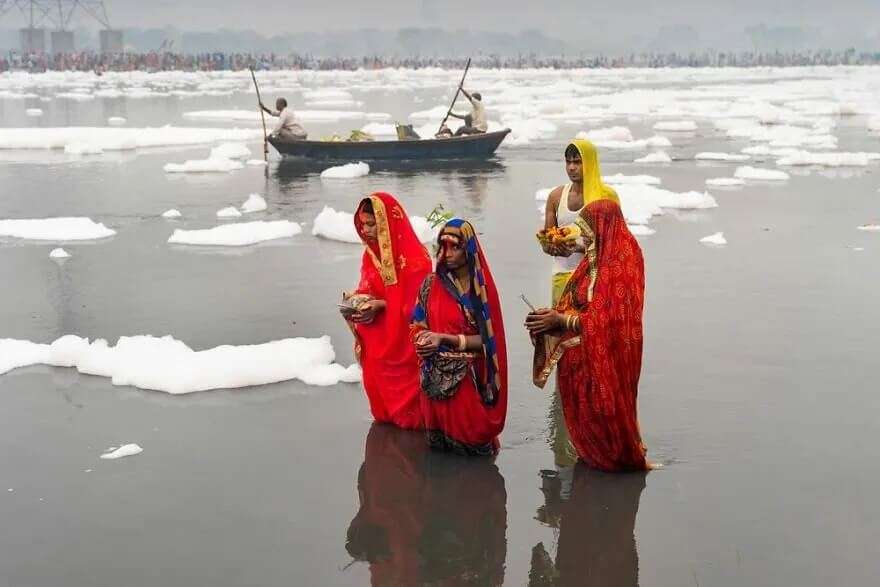 "Devotees Busy Celebrating Chhath Puja" By Mili Paul