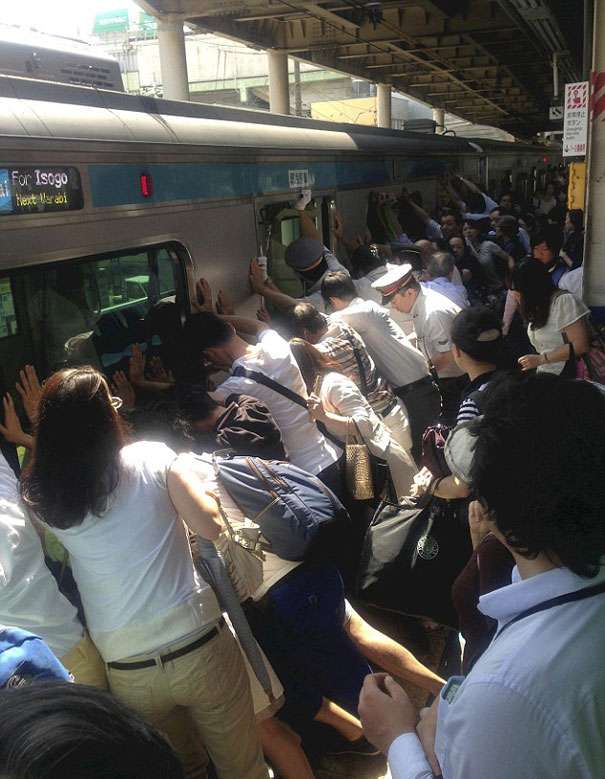 Japanese train passengers pushed away 32-ton weight train car way to rescue woman