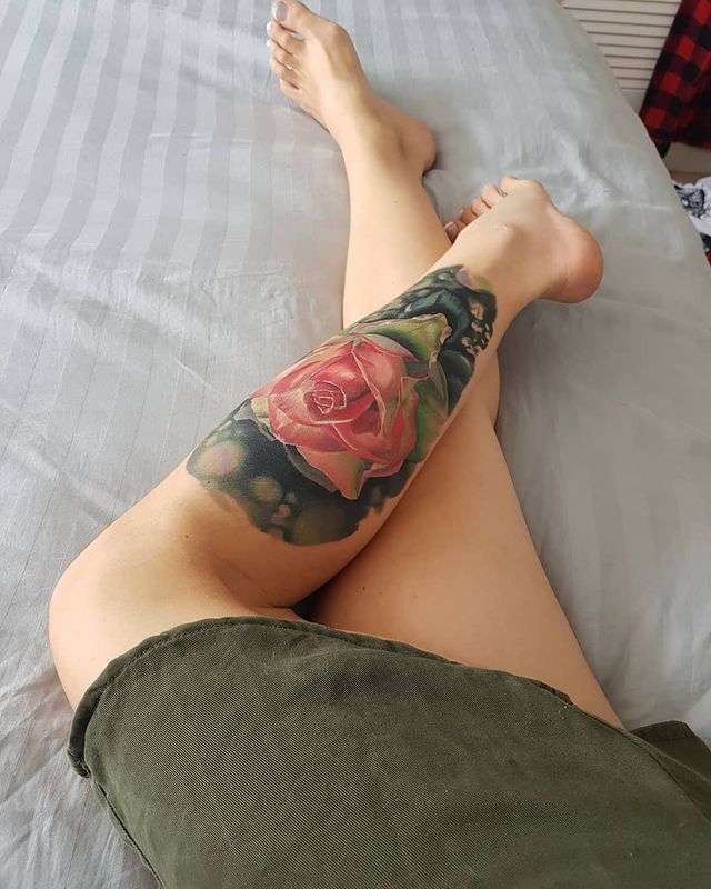 leg tattoos for women, lower leg tattoos for women, lower leg tattoo designs for women, female thigh tattoos history, history of female lower leg tattoos