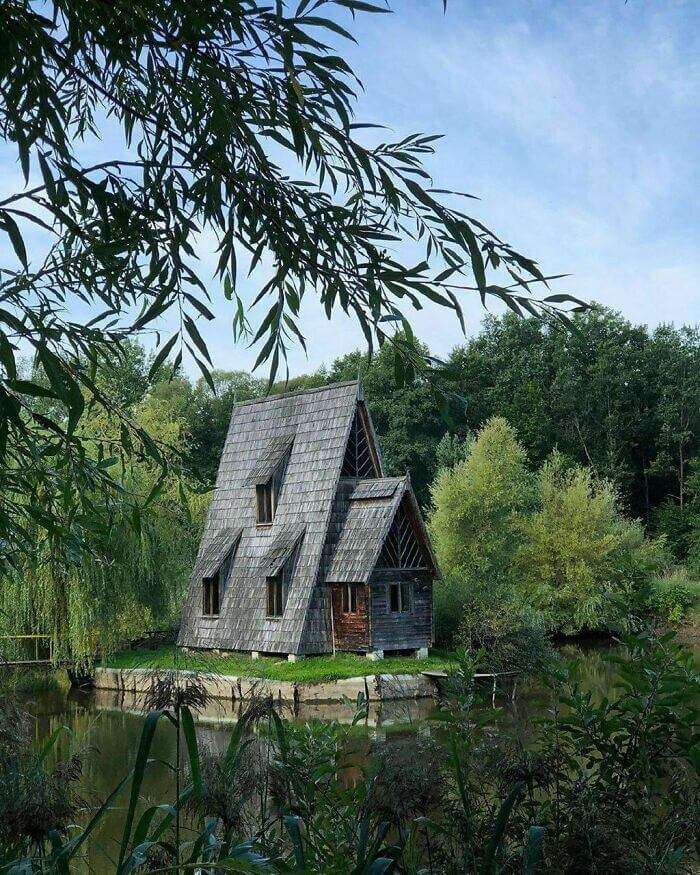 old wooden house in a forest in Ukraine, the forest is next to Zbrui village