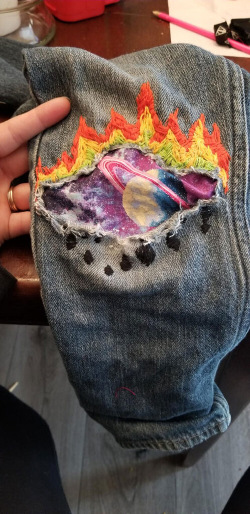 My child’s jeans have knee mend, and he requested “Flames in Space” or it