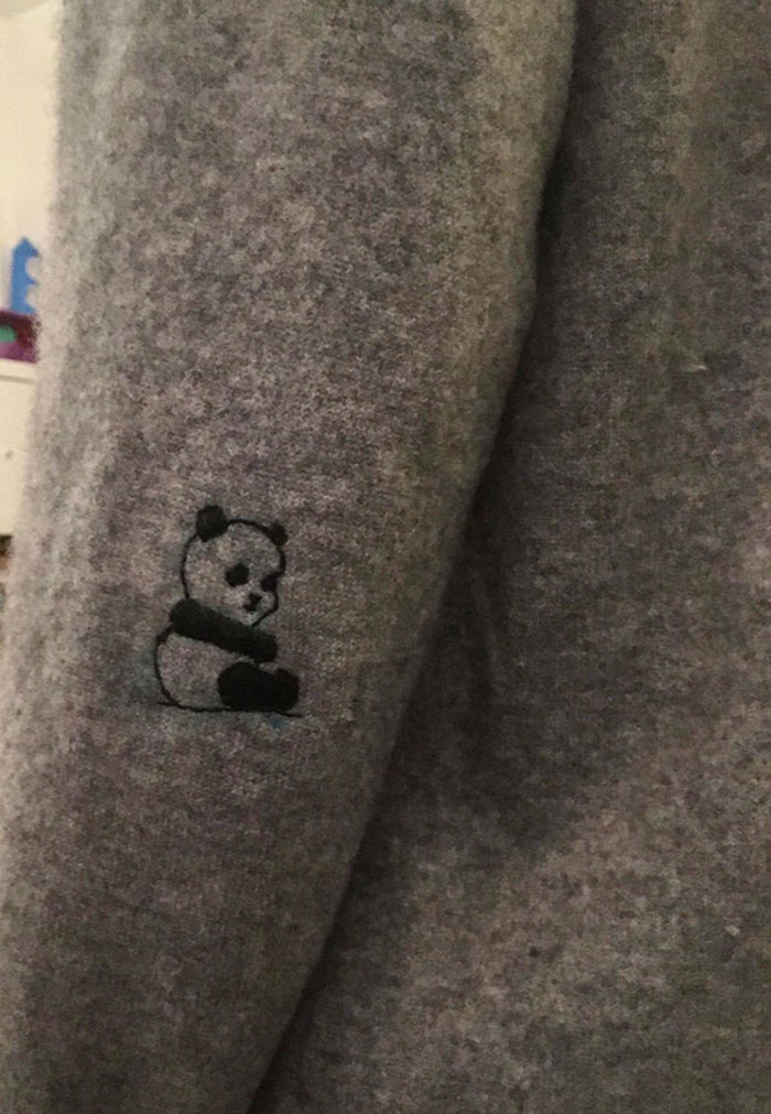 I Made a panda on my elbow, which had a hole earlier