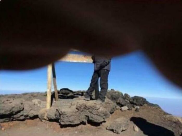 This guy took a week off of work to climb mountain Kilimanjaro to raise money for a charity. His guide captured this image at the summit before the phone died.