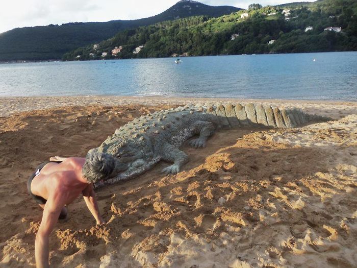 giant crocodile sand sculpture