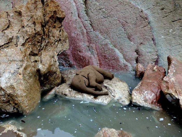 sleeping elephant sand sculpture